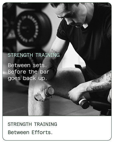 Athlete using KYLA Performance palm cooling device between strength training sets to regulate heat and maintain output